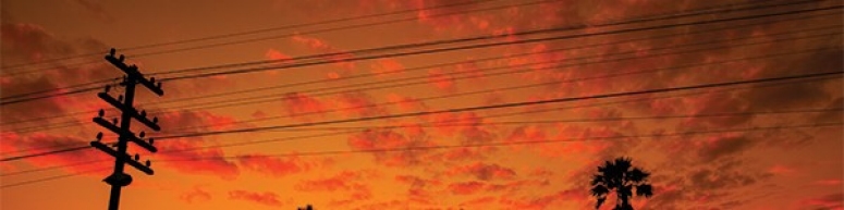 coucher de soleil-lignes-électriques-600 x 150